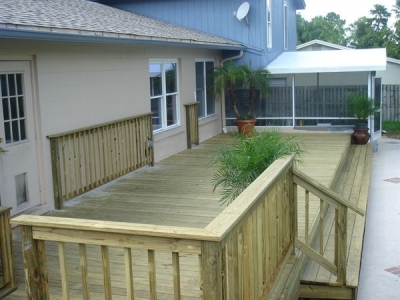 From old forgotten landscape beds to a functional pressure treated wood deck