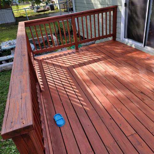Is it better to refinish a deck or replace it in Tampa, FL?