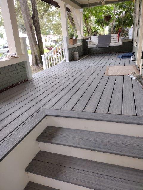 Trex composite porch with white columns built by Jack O' Trades
