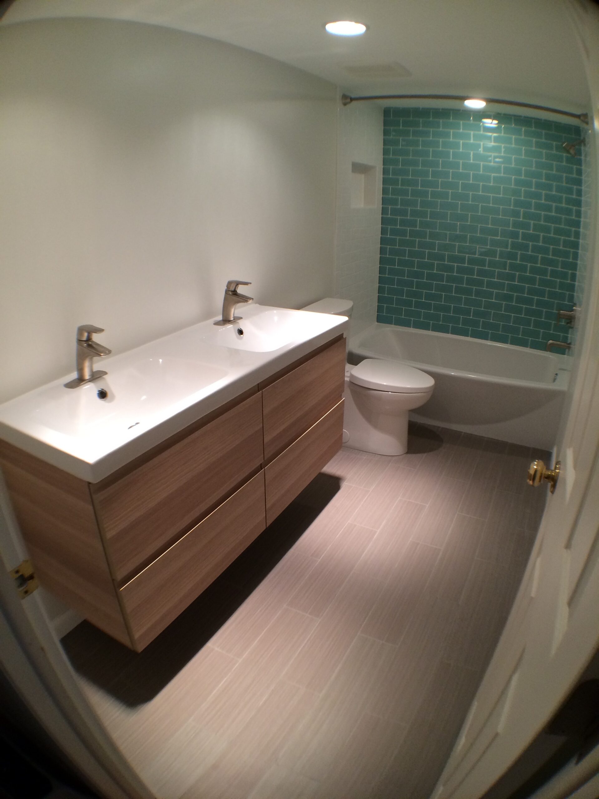 Same Tampa bathroom remodel, vanity and tub view