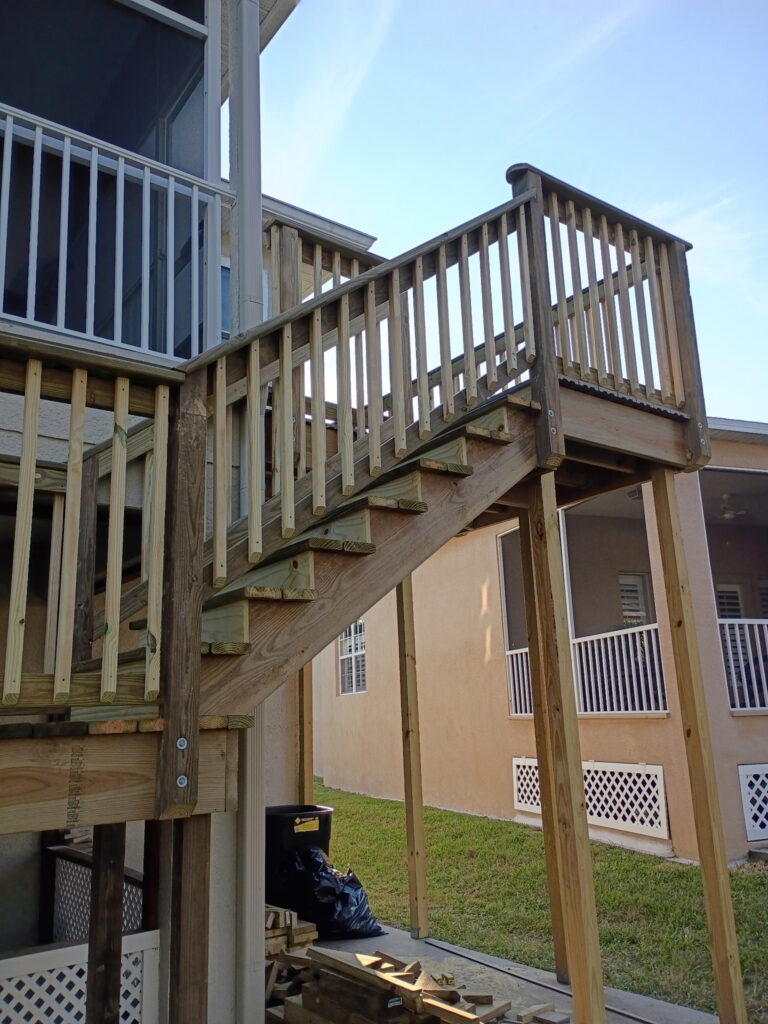 Custom code-compliant second-story deck and staircase in Tarpon Springs, FL.
