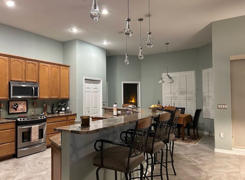 Jennifer's Tampa kitchen remodel with custom quartz countertops and lowered island by Jack O' Trades