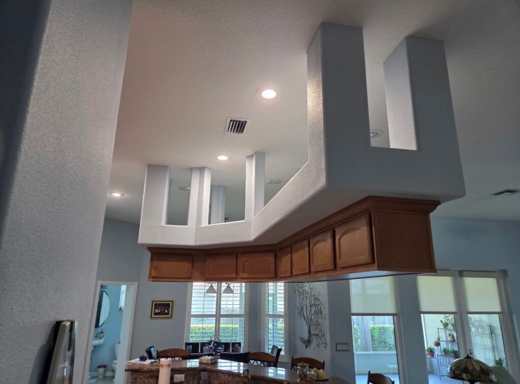 South Tampa kitchen before, with dog-leg soffit above the island